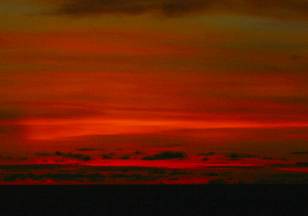 Cartagena red and orange sunset overlooking ocean