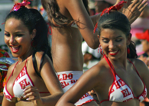 Carnival band dancer wearing white