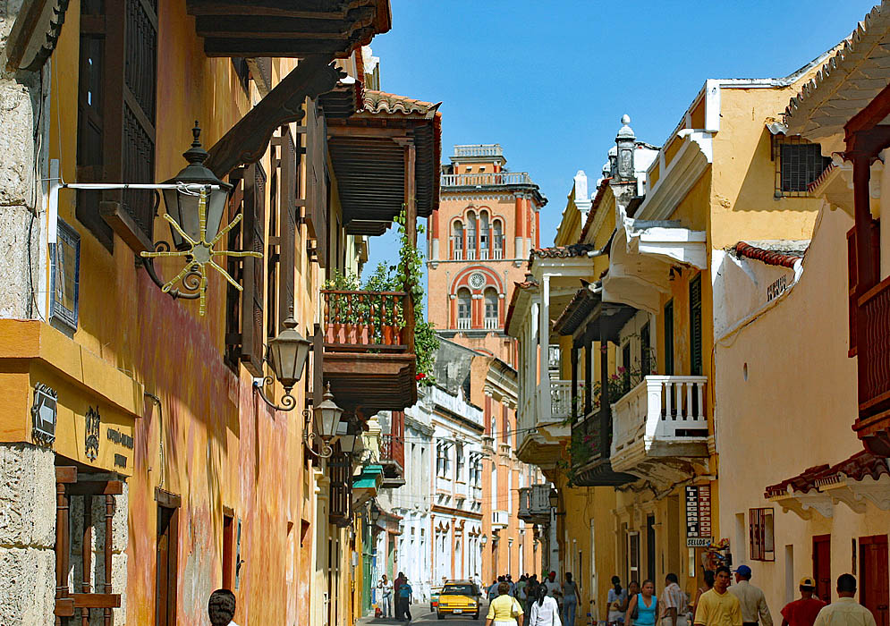 People walking along the narrow old town streets