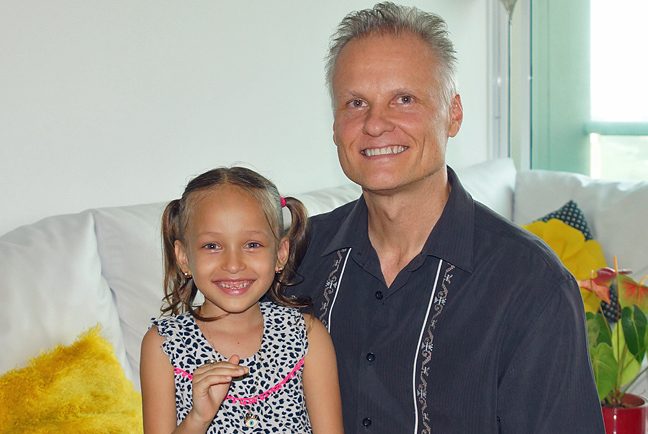 Big smiles for father and daughter