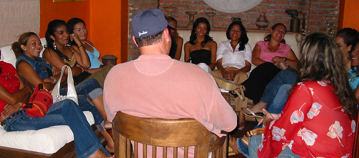 Private romance tour introductions where one man meets many Latinas in small groups