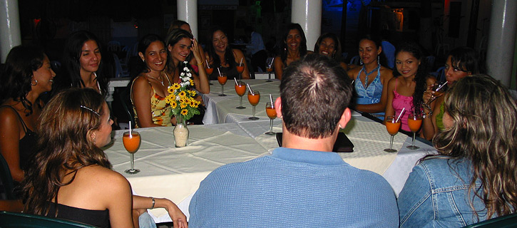 Private romance tour introductions where one man meets many Latinas in small groups