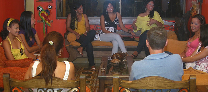 One man meeting a small group of South American women