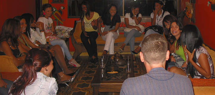One man meeting a small group of South American women