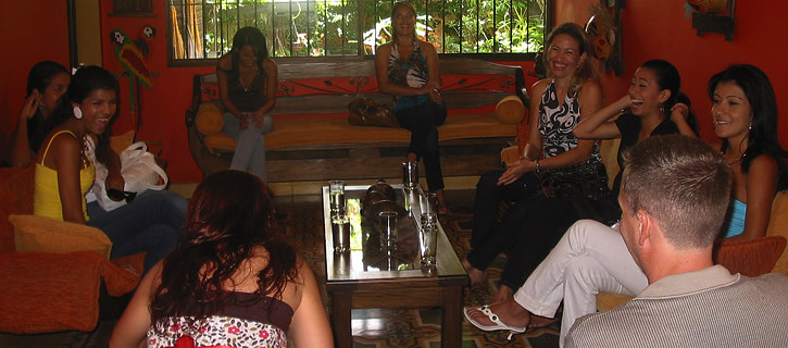 One man meeting a small group of South American women