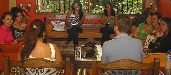 One man meeting a small group of South American women
