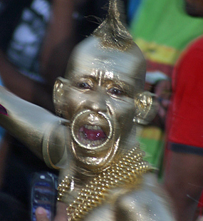 Men wearing black paint and looking ugly