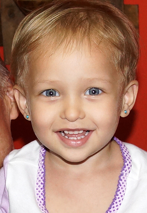 Blond hair and blue eyes and all smiles