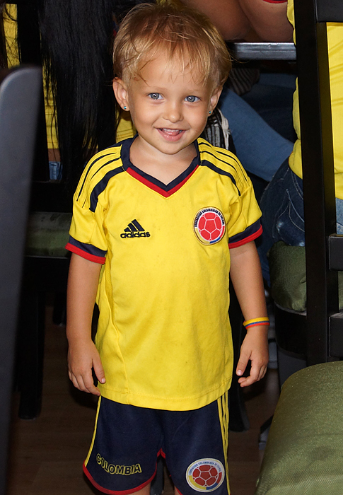 Young toddler wearing a Colombian soccer team uniform