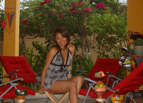 Barranquilla woman modeling the barbecue patio area.