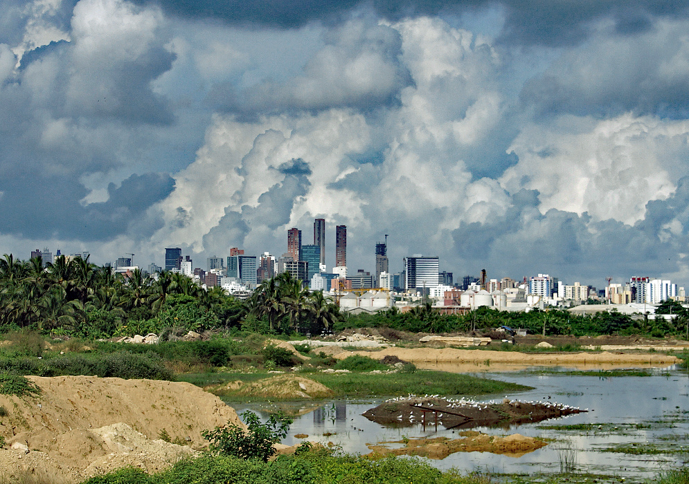 Barranquilla Central Barranquilla high-rises on a clear sunny morning with fluffy clouds