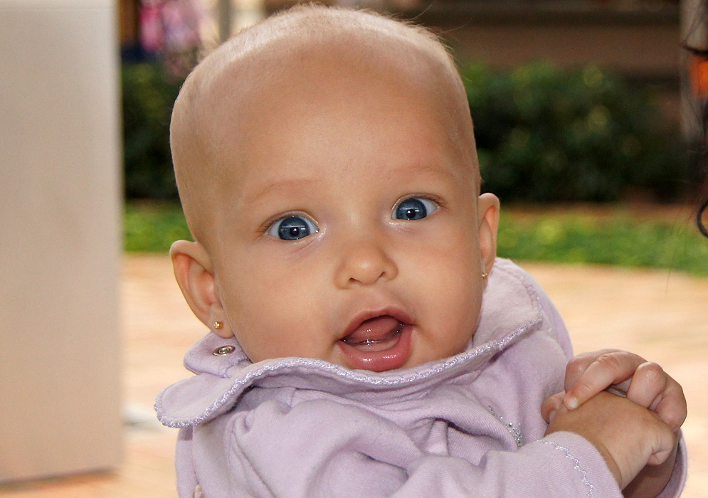 Very beautiful 3 month old American Colombian baby with bright blue eyes