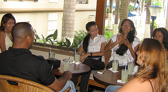 A small group of Colombian women meeting one black man during an International Introductions romance tour