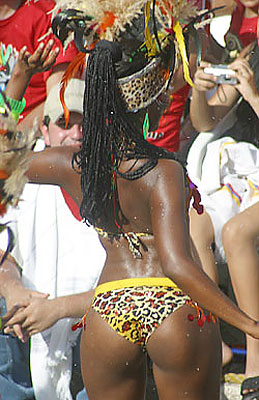 Caribbean woman dancing and shaking to Carnival Music