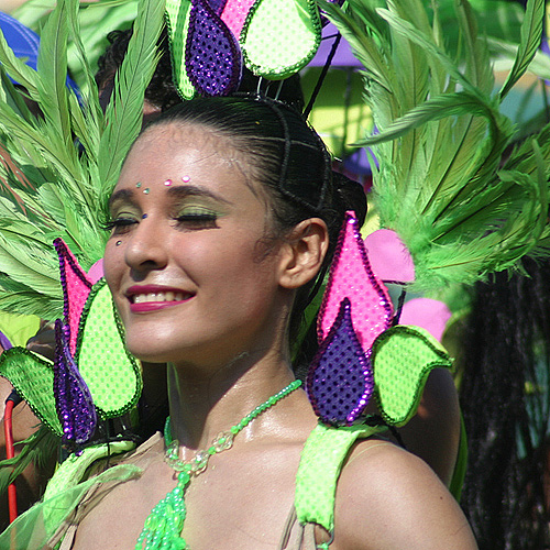 Exotic Barranquilla woman dancing in the streets during Carnival