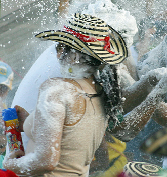 Woman on the losing end of a foam attack