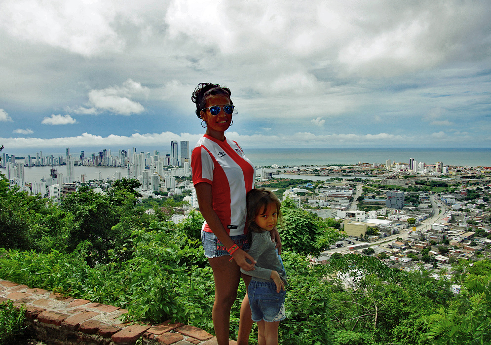 A Colombian mom and her daughter on a hill-top overlooking Cartagena