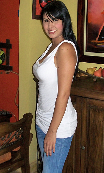 Colombian Woman With Voluptuous Figure Colombian woman with long black hair, smooth complexion, a voluptuous full-figured shape, and a confident sideways pose