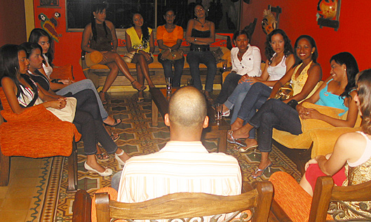 A small group of Colombian women meeting one black man during an International Introductions romance tour