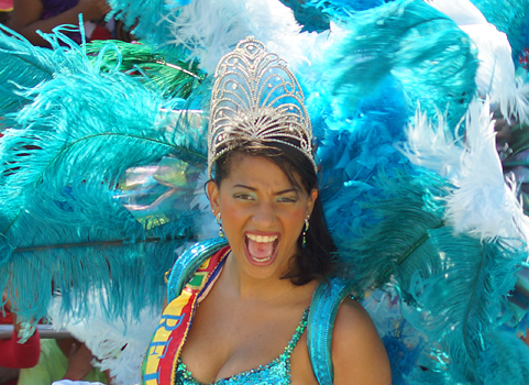 Carnival woman in orange feathers