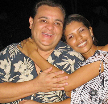 Happy couple holding each other and smiling