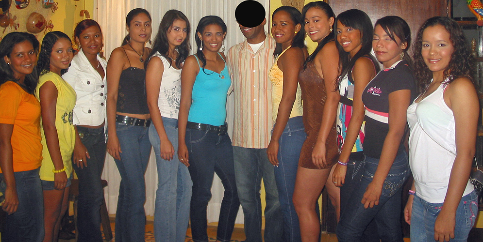 One man surrounded by many beautiful Colombian Women