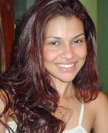 Redheaded Latin woman smiling