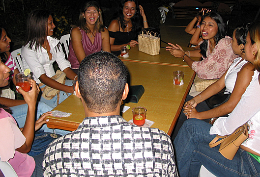 A small group of Colombian women meeting one black man during an International Introductions romance tour