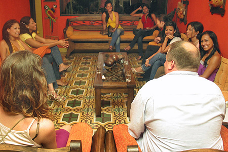 International Introductions Personal Introductions A small group of women meeting one man during a romance tour