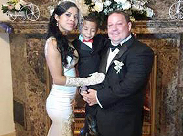 American man and Colombian woman and her child in a wedding cermony