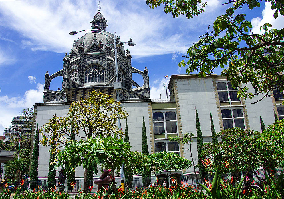 A Gothic Revival culture center with a grey dome roof