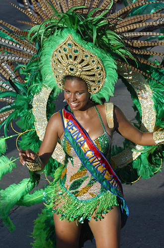 Dark Carnival woman in blue feather costume