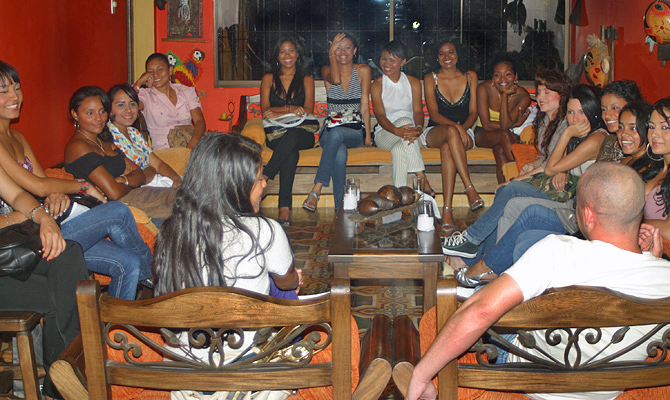International Introductions Personal Introductions A small group of women meeting one man during a romance tour