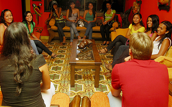 A small group of Latin women meeting one man during a romance tour