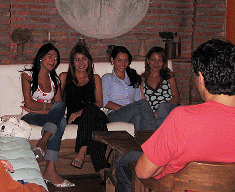 A small group of Latin women meeting one man during a romance tour