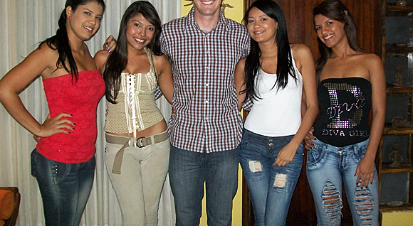 A small group of Latin women meeting one man during a romance tour