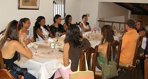 A small group of Latin women meeting one man during a romance tour