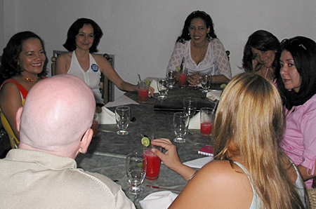 A small group of Latin women meeting one man during a romance tour