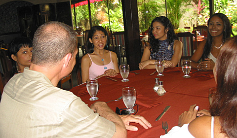 A small group of Latin women meeting one man during a romance tour