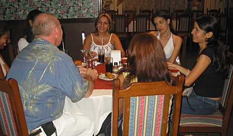 A small group of Latin women meeting one man during a romance tour