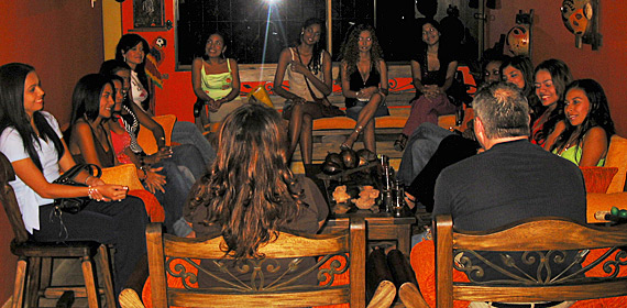 A small group of Latin women meeting one man during a romance tour