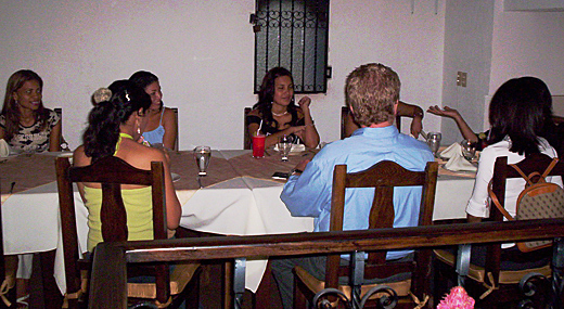 A small group of Latin women meeting one man during a romance tour