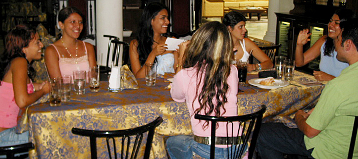 A small group of Latin women meeting one man during a romance tour