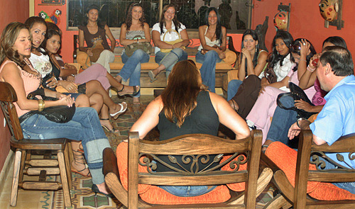 International Introductions Personal Introductions A small group of women meeting one man during a romance tour