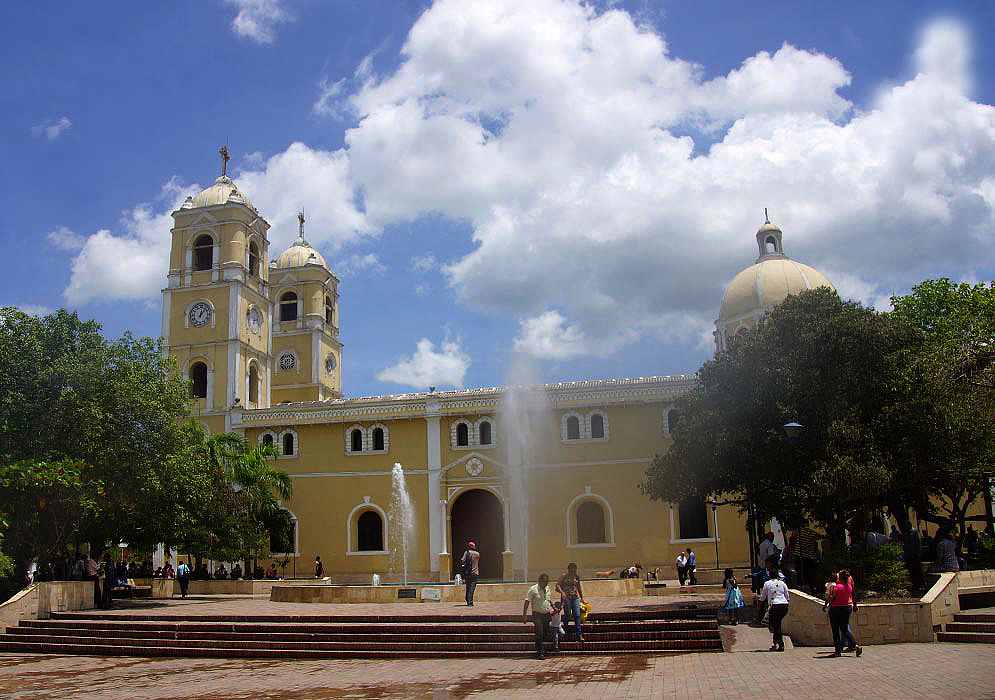 Plaza, church and water fountains 