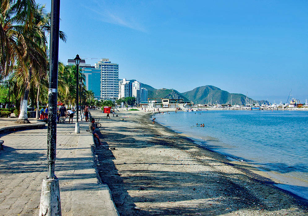 Walkway along the beach towards the boat harbor